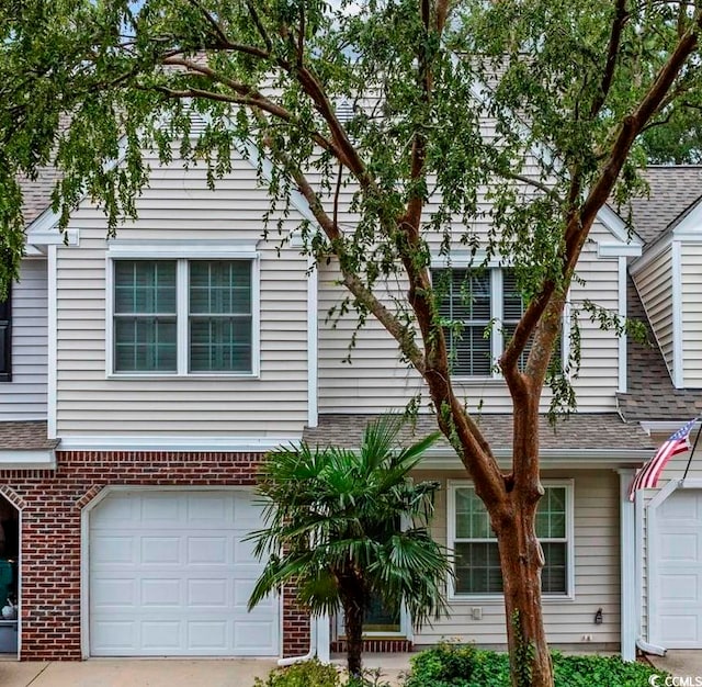 view of front of property with a garage