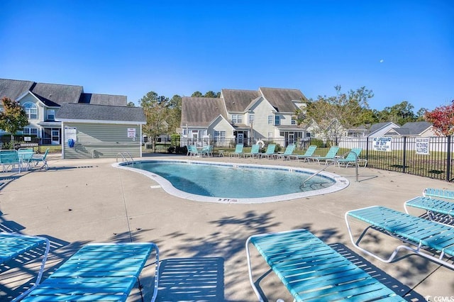 view of swimming pool featuring a patio