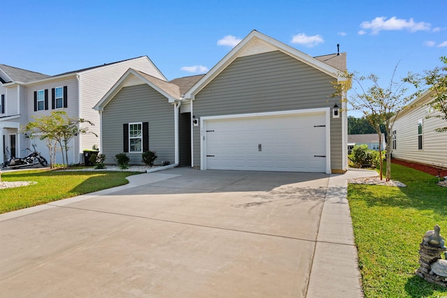 view of front facade with a front lawn and a garage