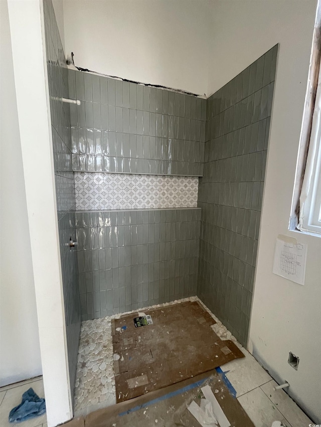 bathroom with a walk in shower