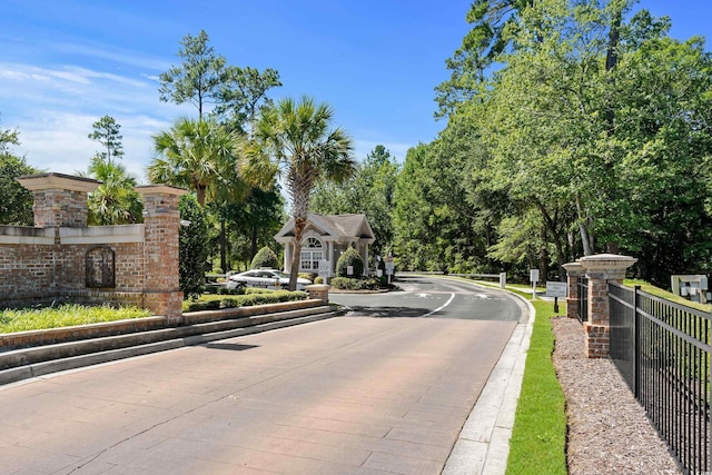 view of road with curbs