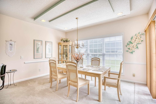 dining space with a textured ceiling, light colored carpet, a chandelier, baseboards, and recessed lighting