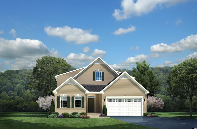 view of front of property with a garage and a front yard