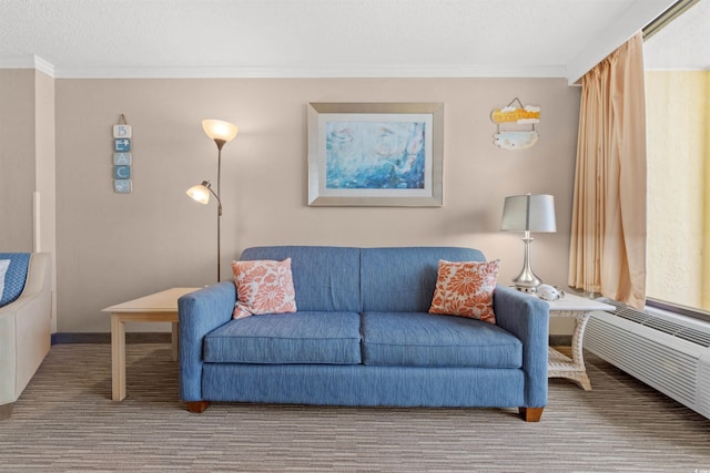 living room featuring crown molding, carpet floors, and a textured ceiling