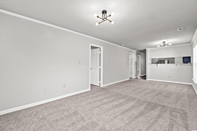 4273 Villas Dr Unit 1007, Little River, SC 29566 - unfurnished living room with an inviting chandelier, ornamental molding, visible vents, a textured ceiling, and carpet flooring