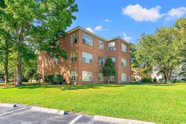 4273 Villas Dr Unit 1007, Little River, SC 29566 - view of building exterior featuring uncovered parking