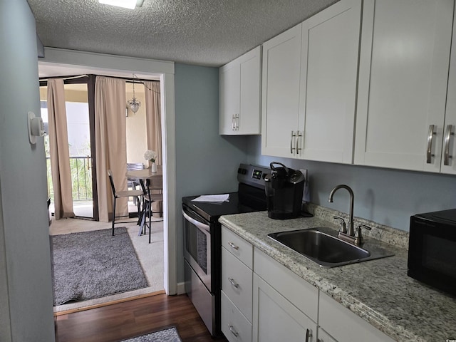 kitchen featuring white cabinetry, sink, dark hardwood / wood-style floors, a textured ceiling, and stainless steel electric stove