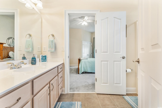 bathroom featuring ceiling fan, vanity, and tile patterned floors