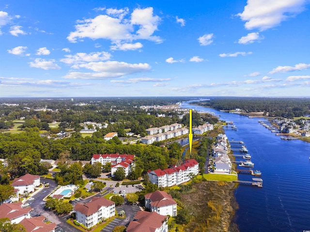 drone / aerial view with a water view