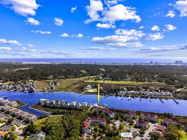 bird's eye view with a water view