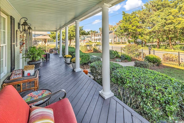 wooden terrace featuring a porch