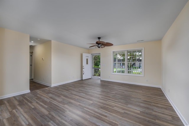 spare room featuring ceiling fan and wood-type flooring