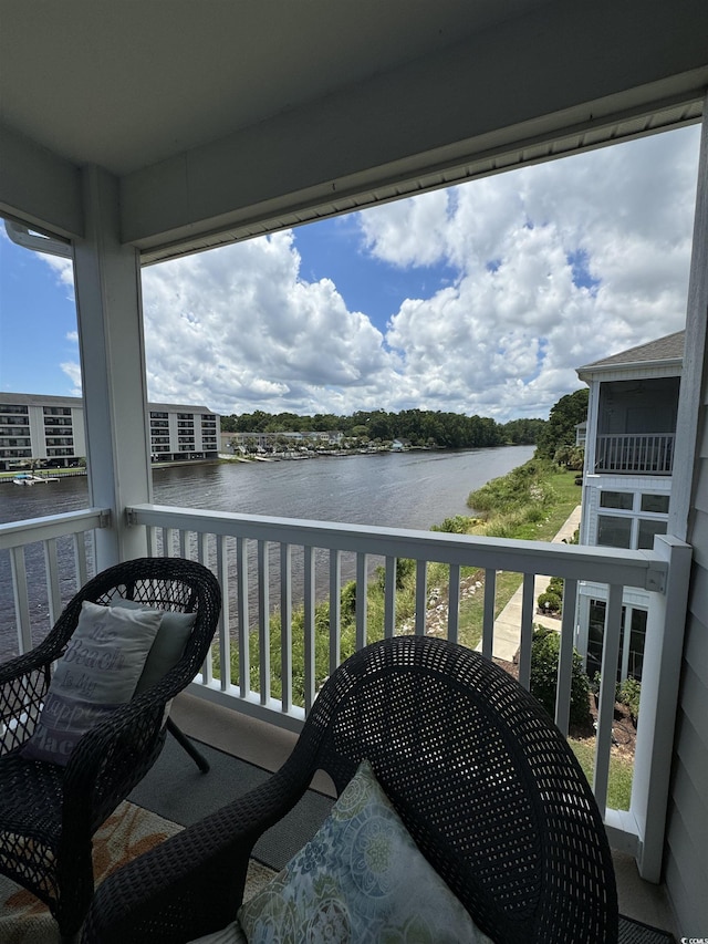 1538 Lanterns Rest Rd Unit 303, Myrtle Beach, SC 29579 - balcony with a water view and outdoor dining area