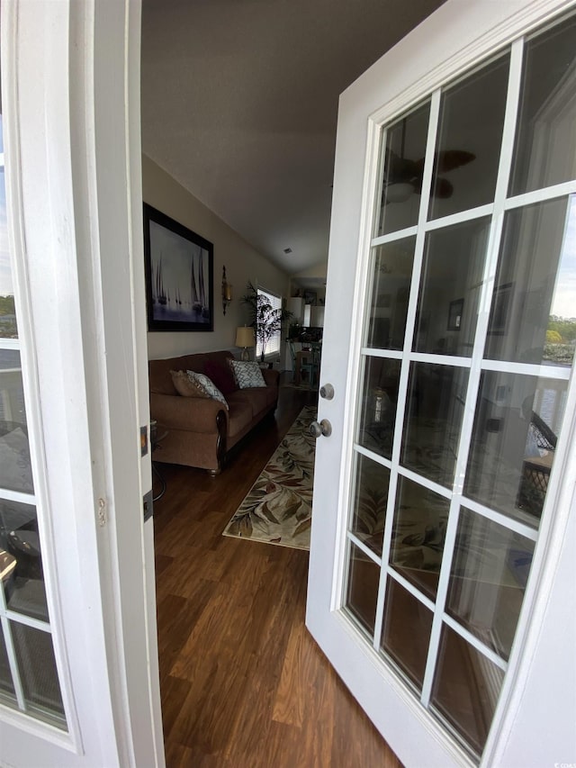 1538 Lanterns Rest Rd Unit 303, Myrtle Beach, SC 29579 - doorway with wood finished floors and vaulted ceiling