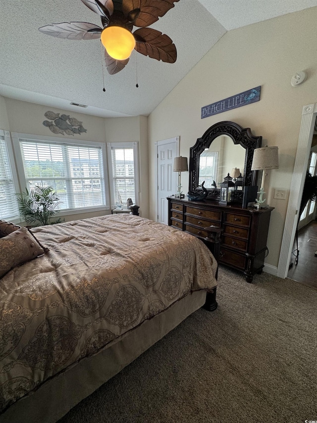 1538 Lanterns Rest Rd Unit 303, Myrtle Beach, SC 29579 - carpeted bedroom featuring lofted ceiling, a textured ceiling, and a ceiling fan