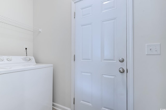 laundry area with washer / dryer