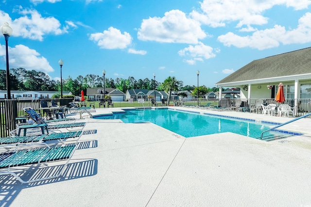 view of swimming pool featuring a patio