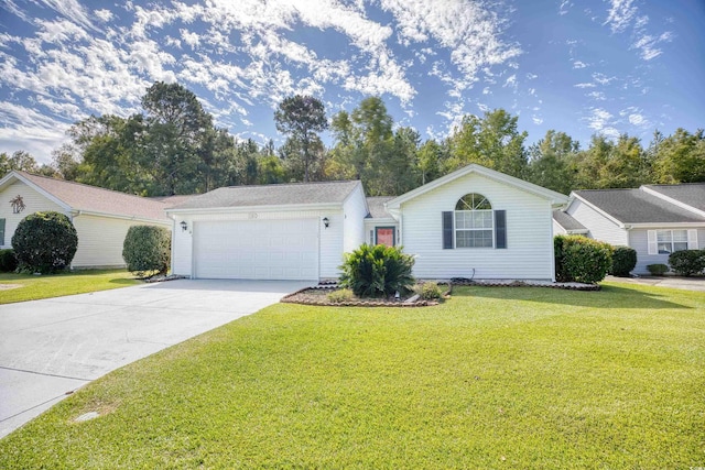 ranch-style house featuring a front yard and a garage