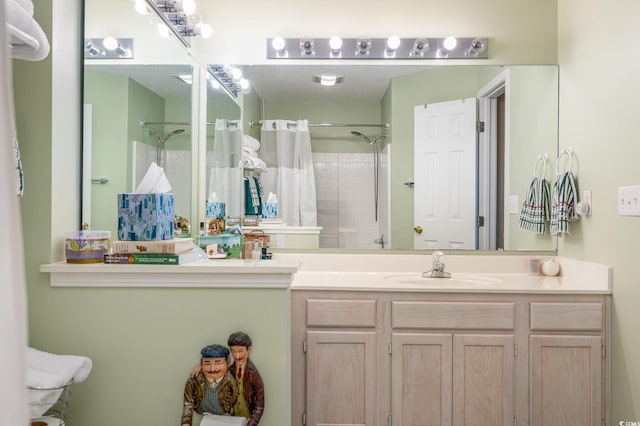 bathroom with vanity and a shower with curtain