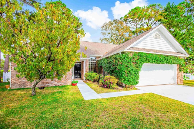 obstructed view of property with a front yard