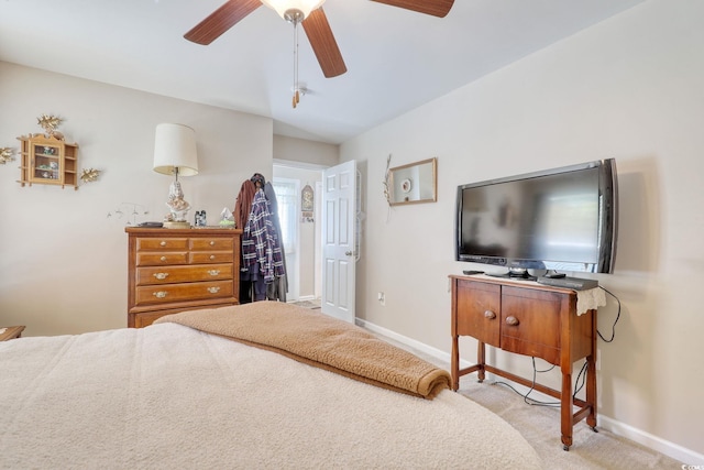 bedroom featuring ceiling fan and light carpet