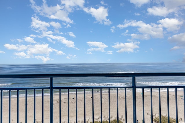 view of water feature with a beach view