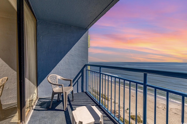 view of balcony at dusk