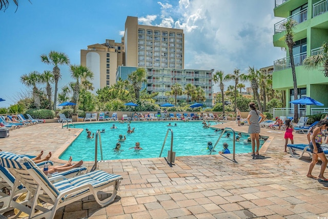 view of swimming pool with a patio area