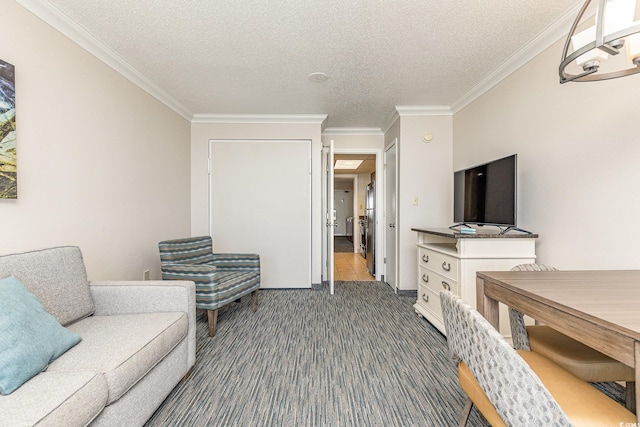 living room with a textured ceiling and crown molding