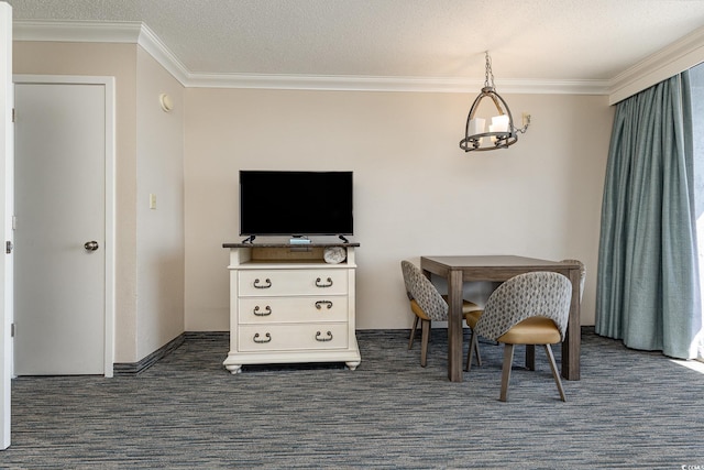 dining area featuring ornamental molding, dark colored carpet, and a textured ceiling