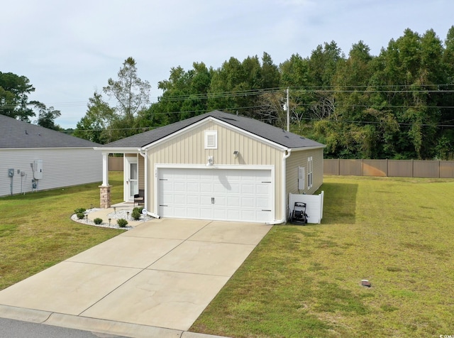 garage with a yard