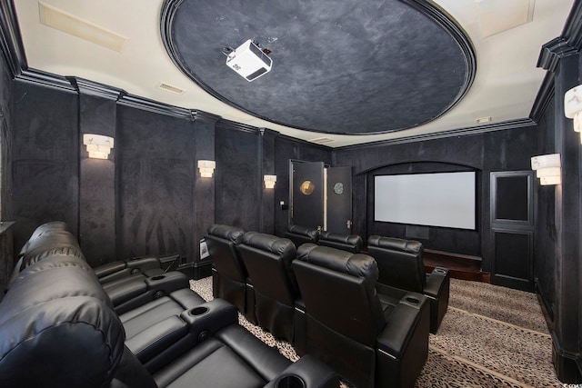 home theater featuring visible vents and ornamental molding