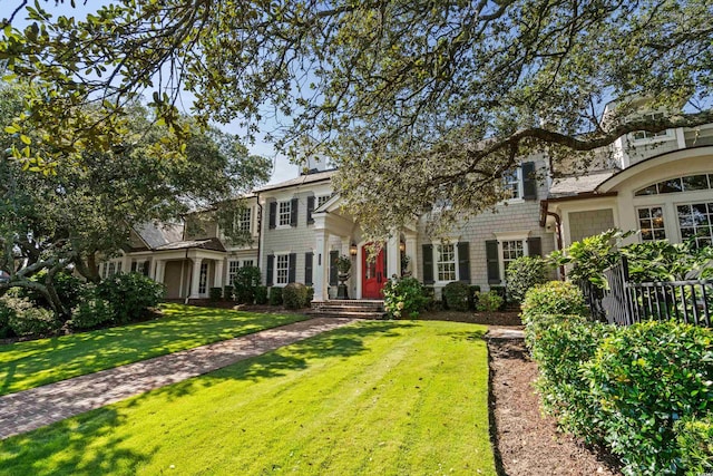 view of front of house with a front lawn