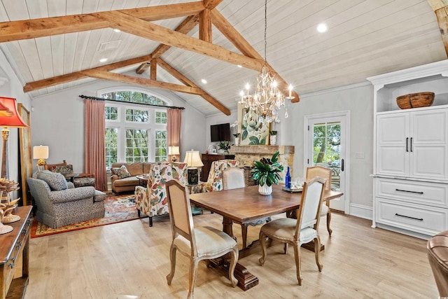 dining area with light hardwood / wood-style floors, a notable chandelier, wooden ceiling, and vaulted ceiling with beams