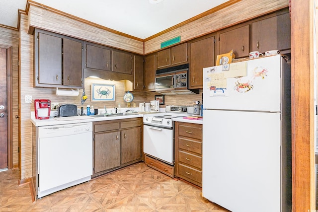1582 S Waccamaw Dr Unit 60, Garden City Beach, SC 29576 - kitchen with white appliances, crown molding, a sink, and light countertops