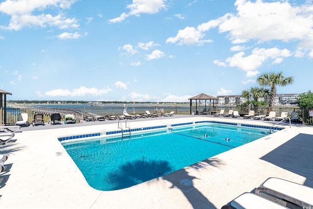 1582 S Waccamaw Dr Unit 60, Garden City Beach, SC 29576 - community pool featuring a gazebo, a patio area, and fence