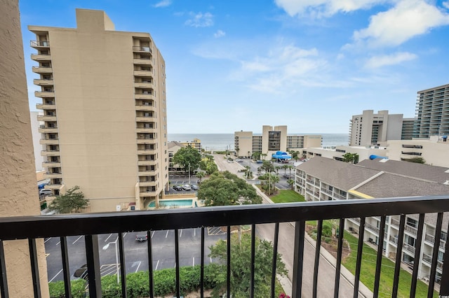 balcony featuring a water view