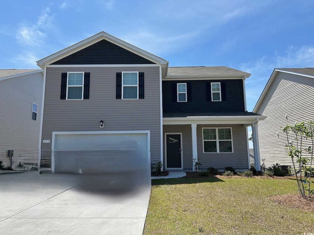 675 Wallace Dr, Little River, SC 29566 - view of front property with a garage
