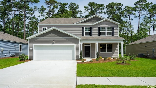 craftsman-style home featuring cooling unit, a front yard, and a garage