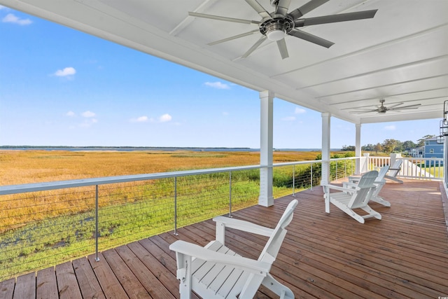 wooden terrace with ceiling fan