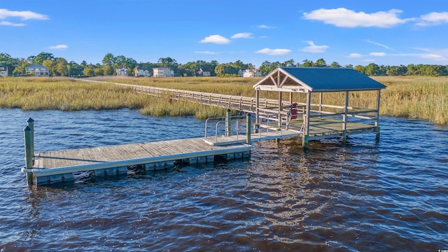 view of dock with a water view