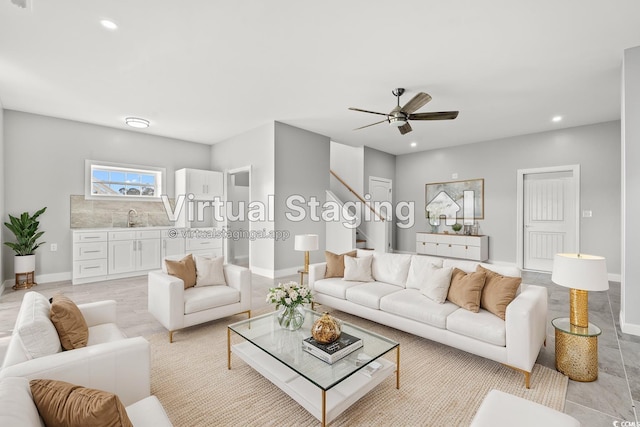 living room with sink and ceiling fan