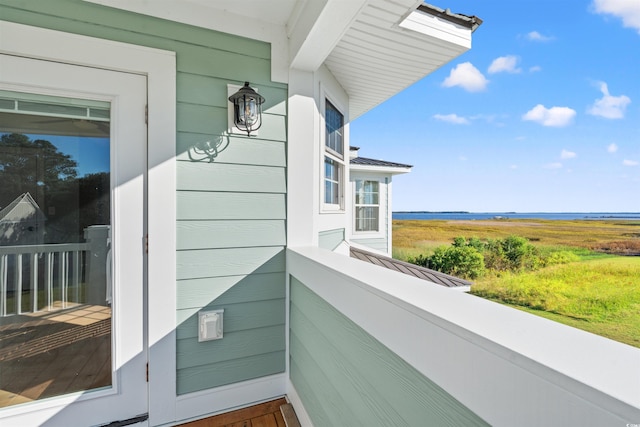 balcony featuring a rural view