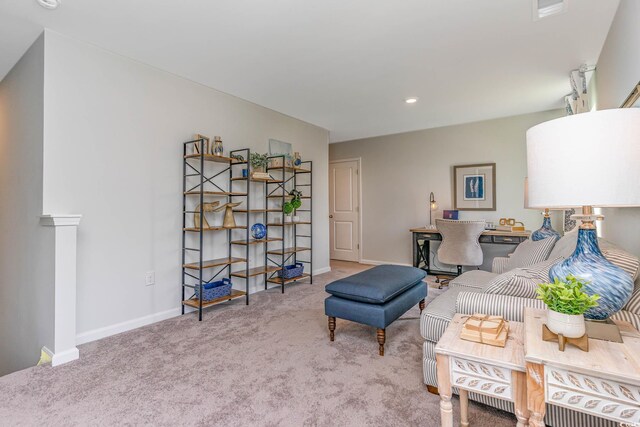 living room with light colored carpet