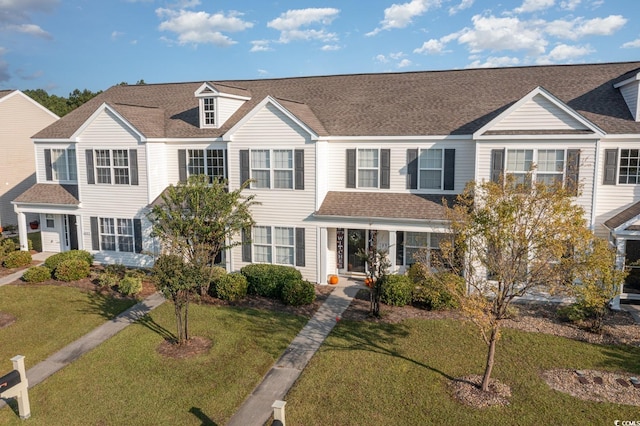 view of front facade with a front lawn