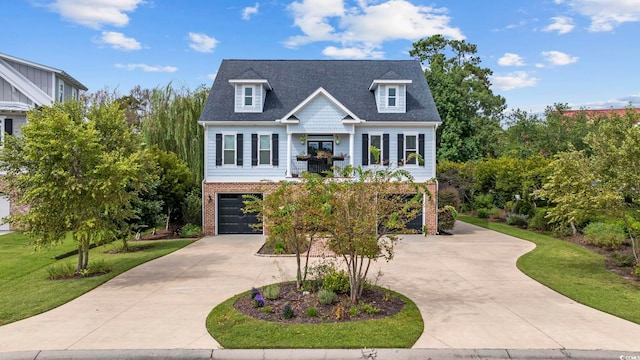 view of front facade with a garage and a front yard