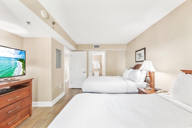 2504 N Ocean Blvd Unit 1736, Myrtle Beach, SC 29577 - bedroom featuring light wood-type flooring, baseboards, and electric panel