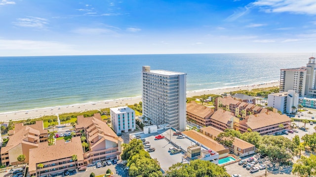 aerial view featuring a water view and a beach view