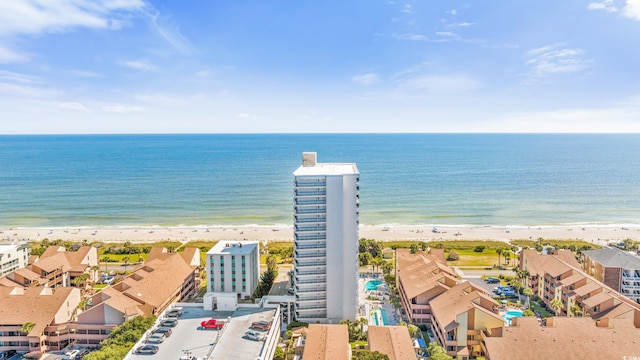 aerial view featuring a water view and a view of the beach