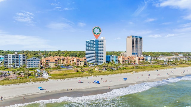 aerial view featuring a water view and a beach view